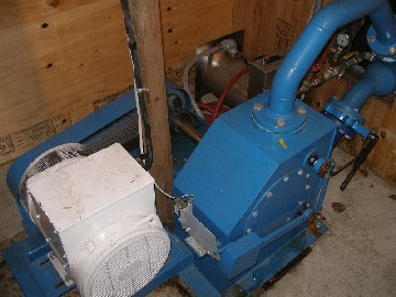 The generator is coupled with a belt.